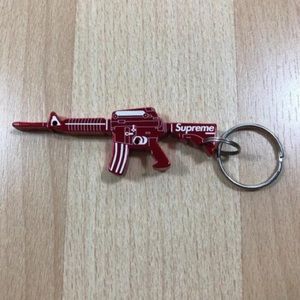 Supreme Red Gun Bottle Opener Keychain M16
